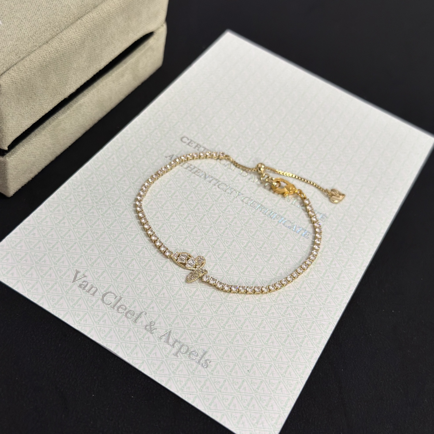 Van Cleef Arpels Alhambra bracelet gold-tone metal with clear diamond-like stones 18cm