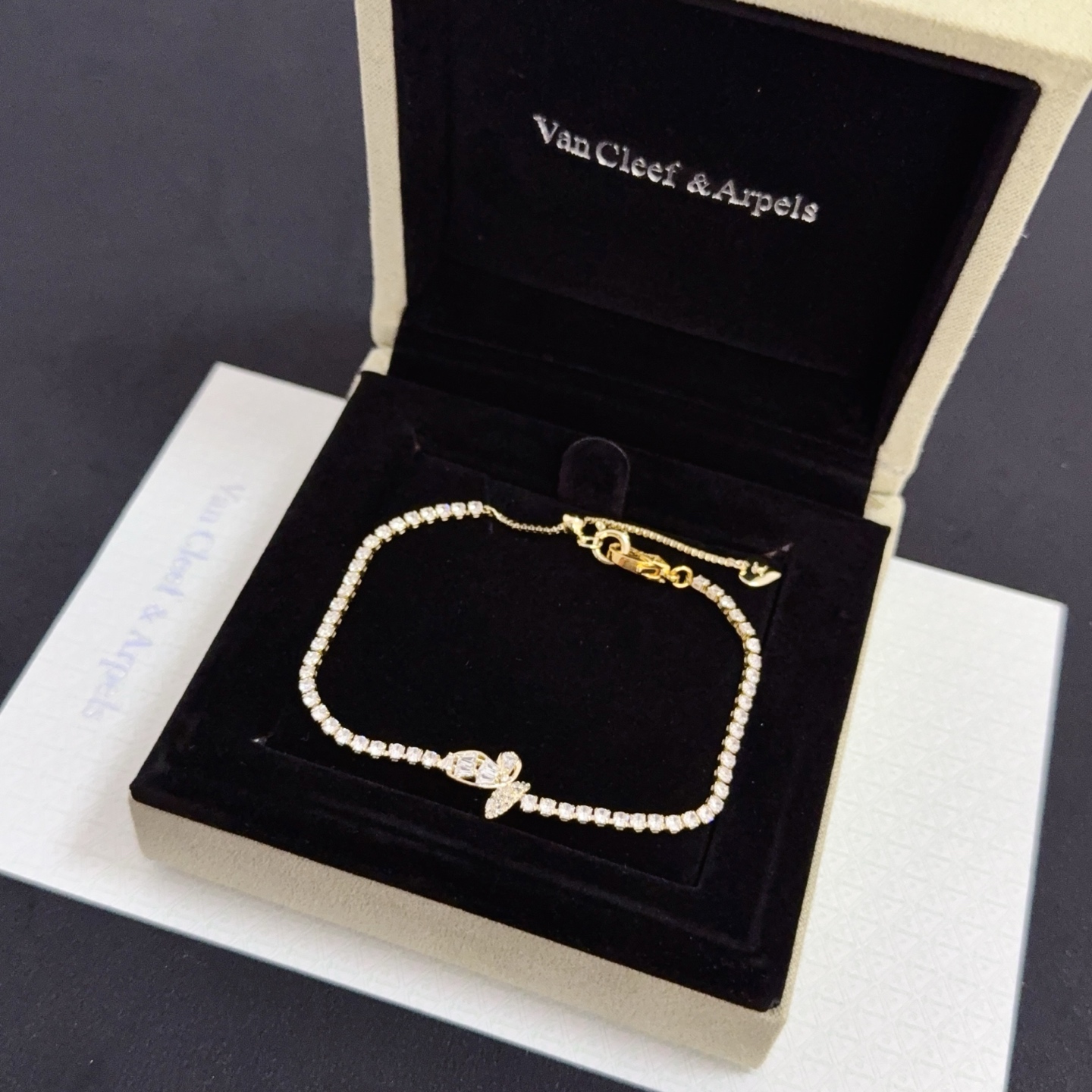 Van Cleef Arpels Alhambra bracelet gold-tone metal with clear diamond-like stones 18cm