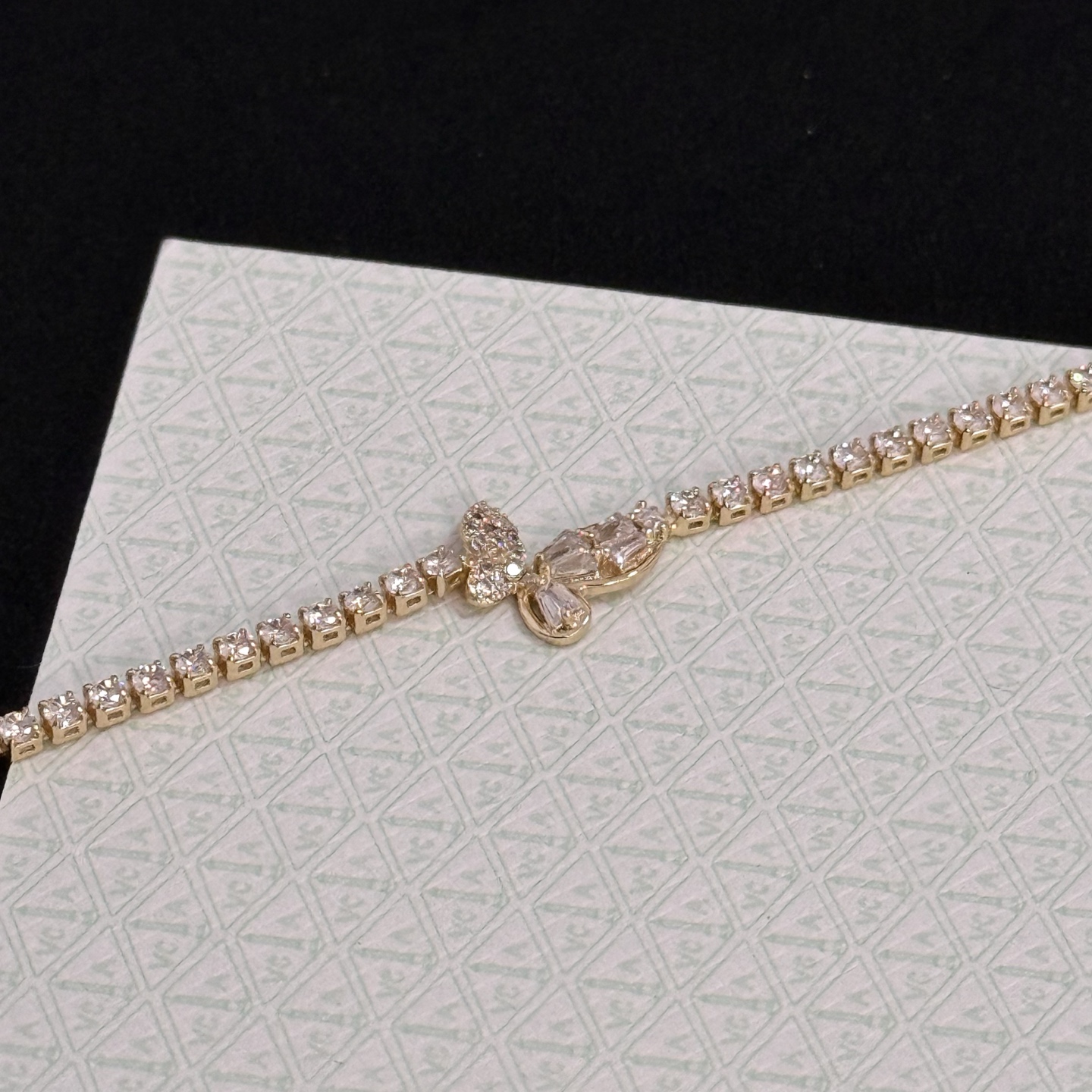 Van Cleef Arpels Alhambra bracelet gold-tone metal with clear diamond-like stones 18cm