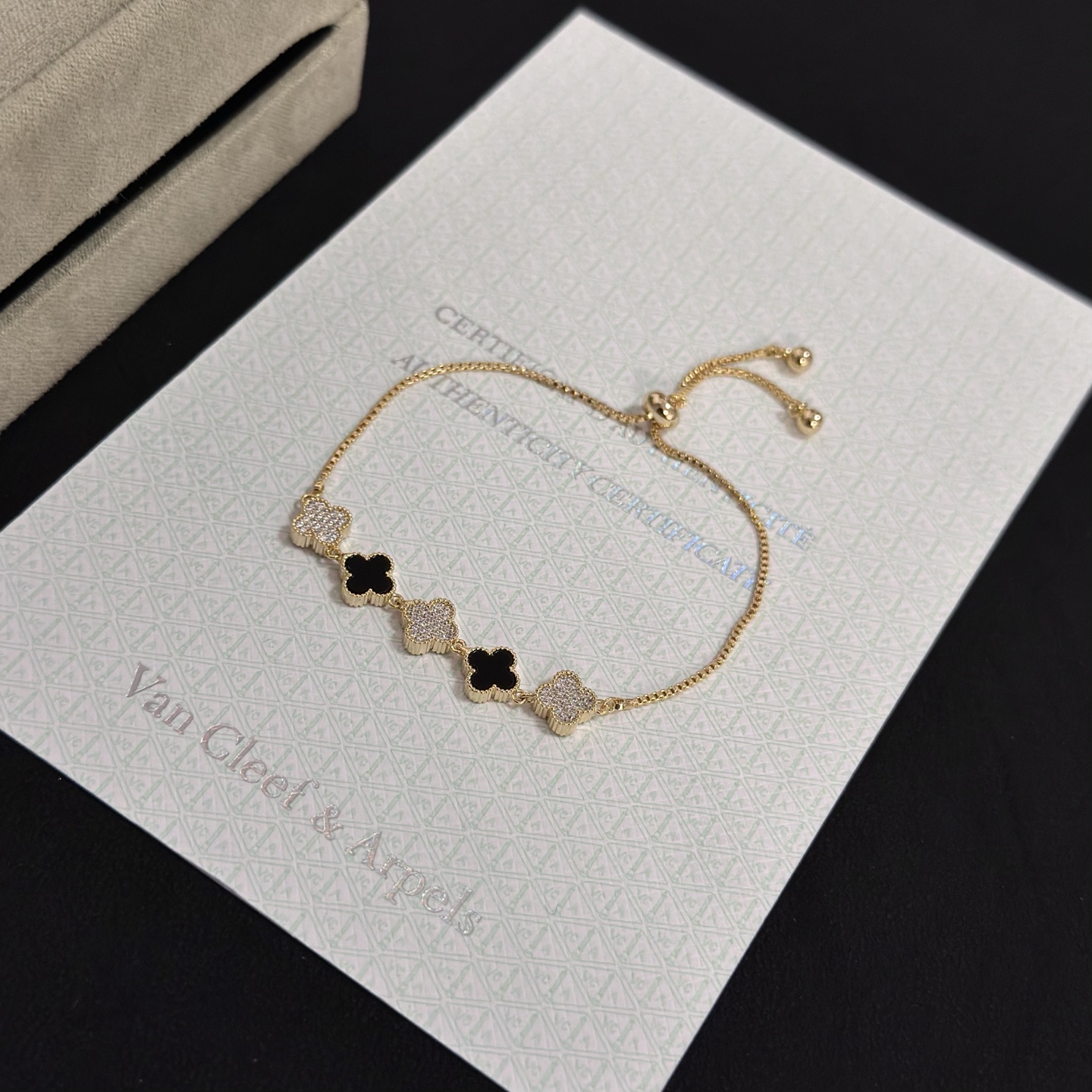 Van Cleef Arpels Alhambra bracelet yellow gold metal black onyx clover motifs clear diamond-paved clover motifs adjustable sliding bolo chain fits 15-20cm wrist