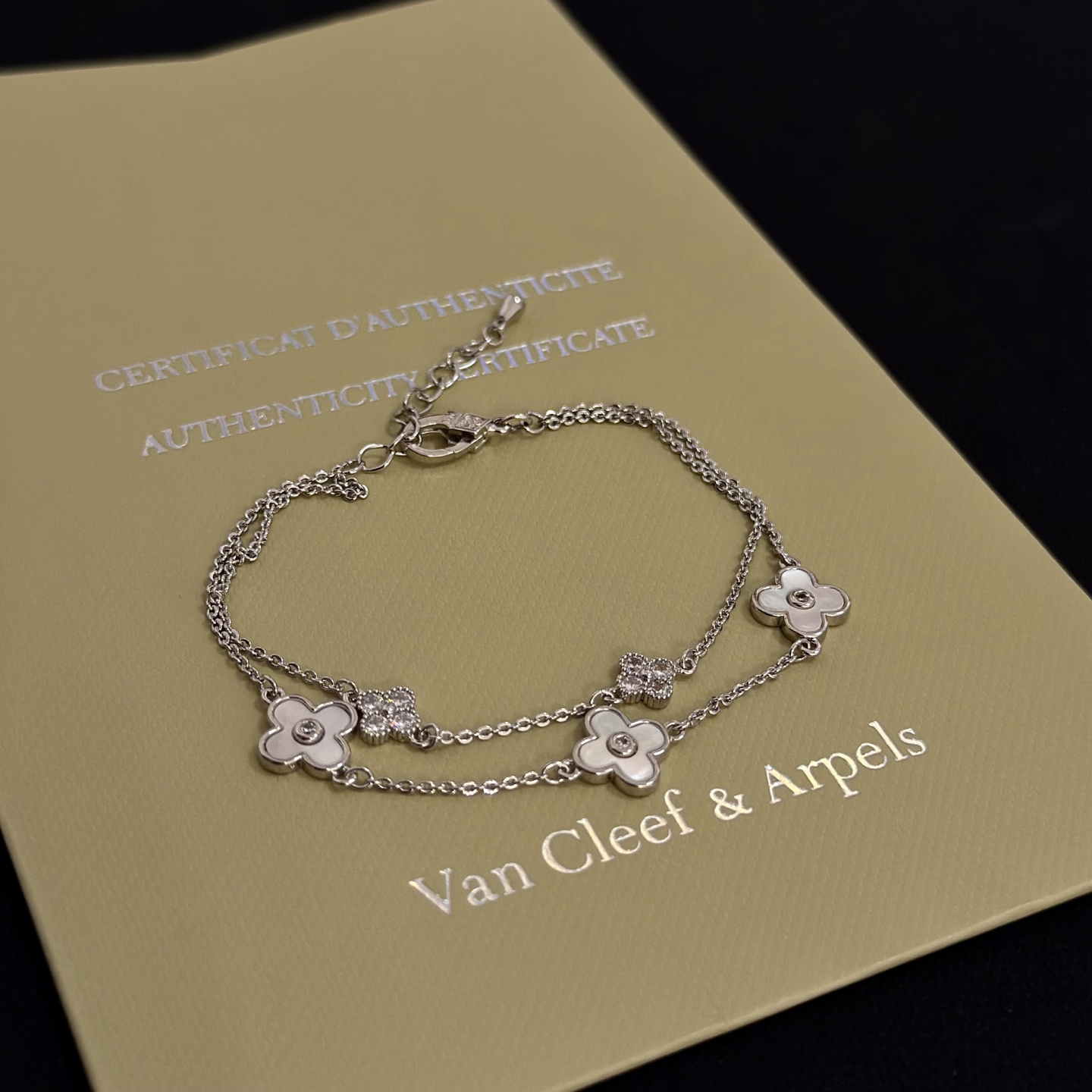 Van Cleef Arpels Alhambra bracelet silver-toned metal white mother-of-pearl clear diamond accents 17cm with 3cm extender