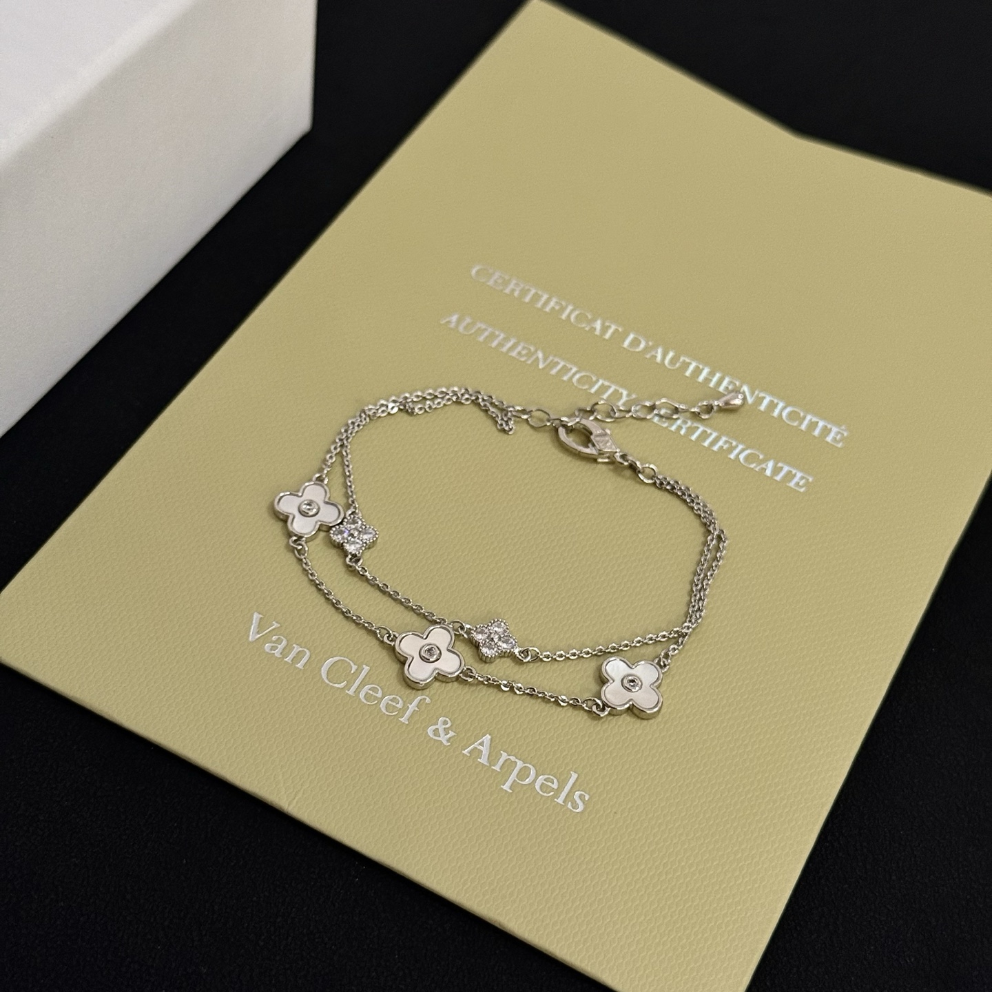 Van Cleef Arpels Alhambra bracelet silver-toned metal white mother-of-pearl clear diamond accents 17cm with 3cm extender
