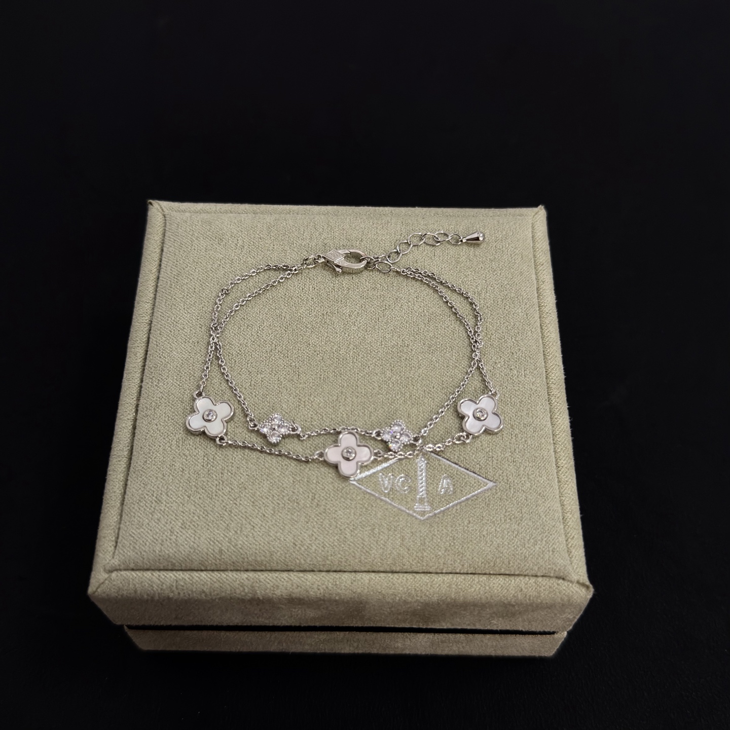 Van Cleef Arpels Alhambra bracelet silver-toned metal white mother-of-pearl clear diamond accents 17cm with 3cm extender