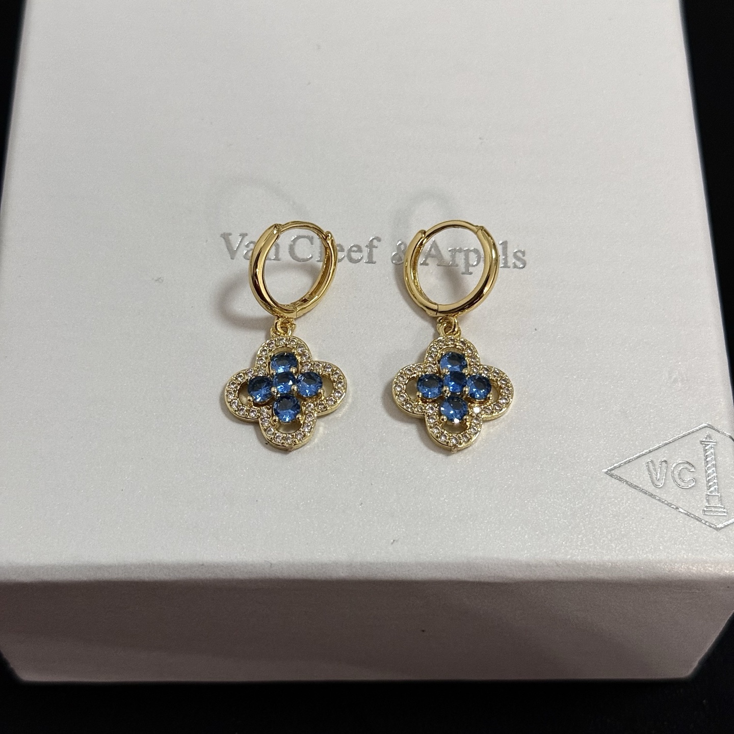 Van Cleef Arpels Alhambra earrings yellow gold metal blue gemstones white diamond accents 12mm hoop diameter 10mm pendant drop
