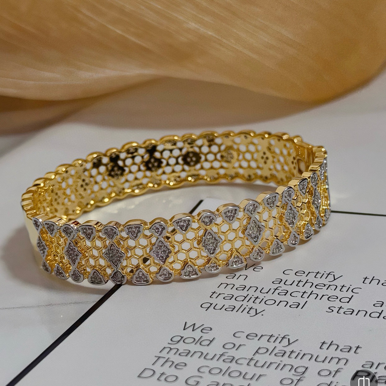 Piaget Serpenti Viper bracelet 18k yellow gold with clear diamond accents 17cm inner circumference