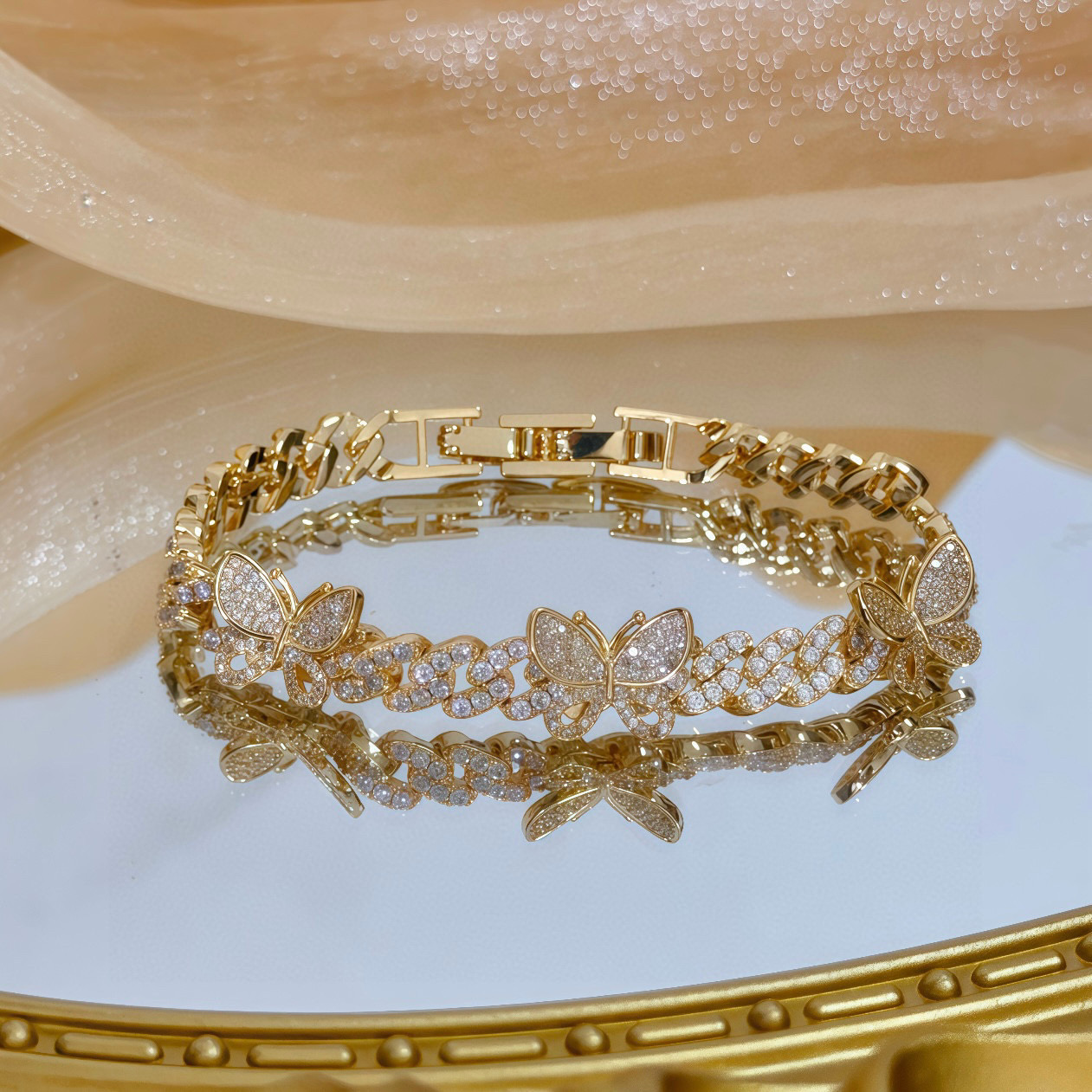 Piaget Butterfly Pave Cuban Link bracelet yellow gold with clear diamond-like pave stones 7 inches