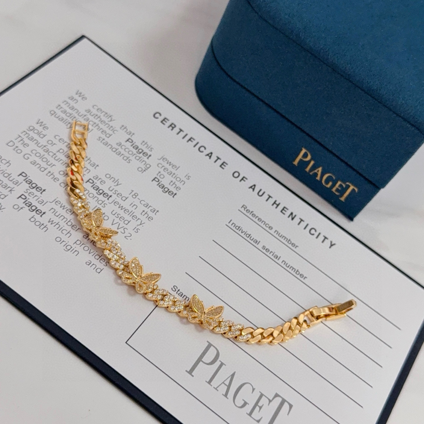Piaget Butterfly Pave Cuban Link bracelet yellow gold with clear diamond-like pave stones 7 inches