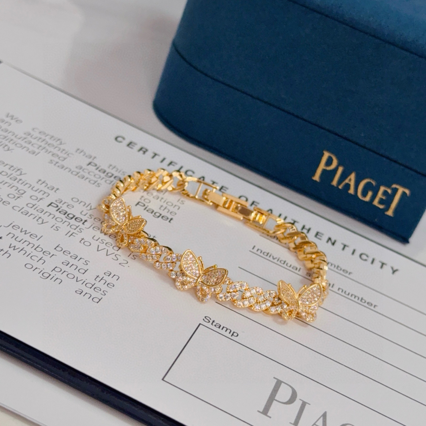Piaget Butterfly Pave Cuban Link bracelet yellow gold with clear diamond-like pave stones 7 inches