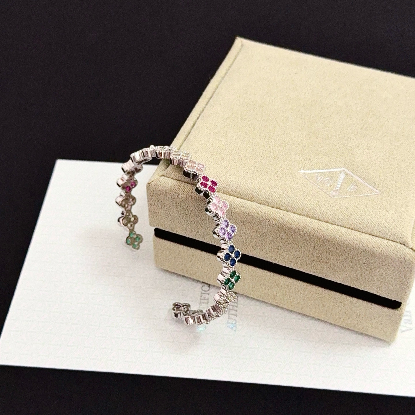 Van Cleef Arpels Alhambra bracelet Silver-toned metal with multicolor gemstones ruby red emerald green sapphire blue pink purple champagne 17cm