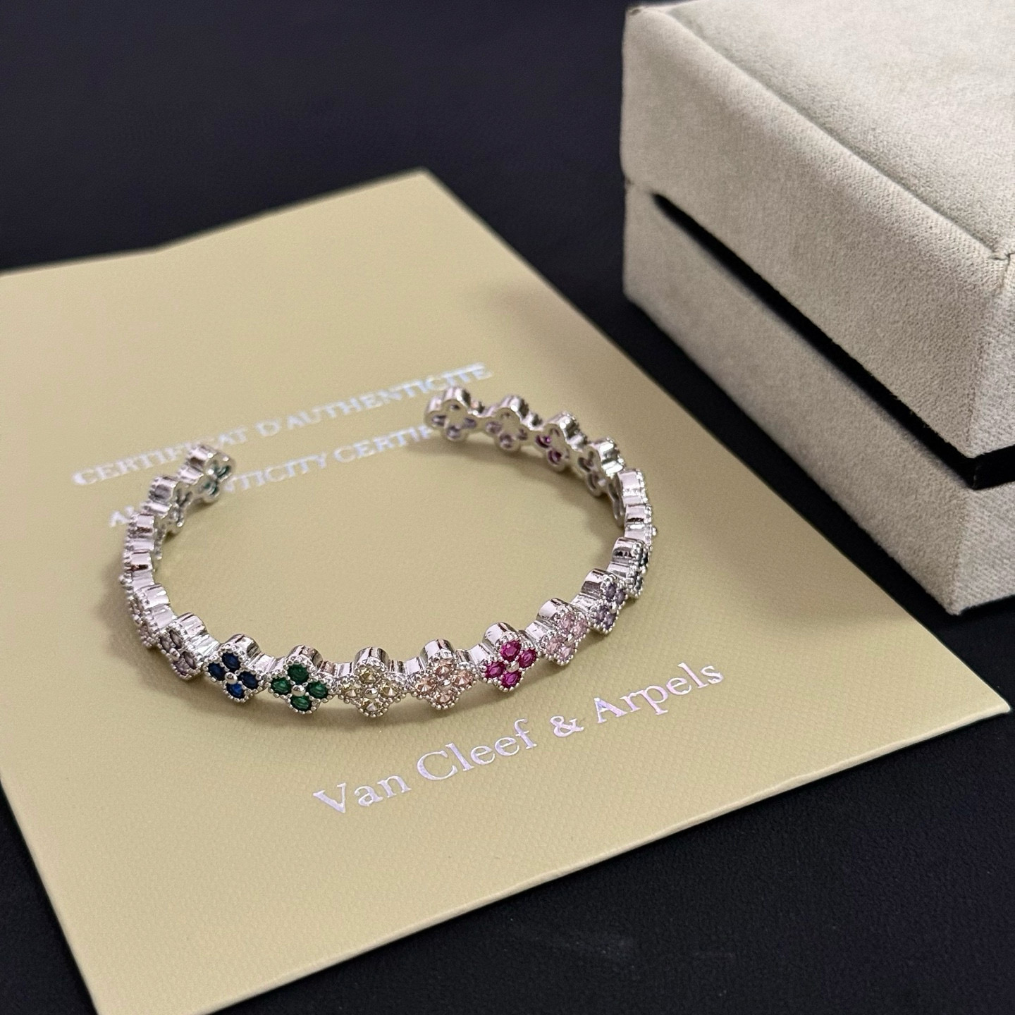 Van Cleef Arpels Alhambra bracelet Silver-toned metal with multicolor gemstones ruby red emerald green sapphire blue pink purple champagne 17cm