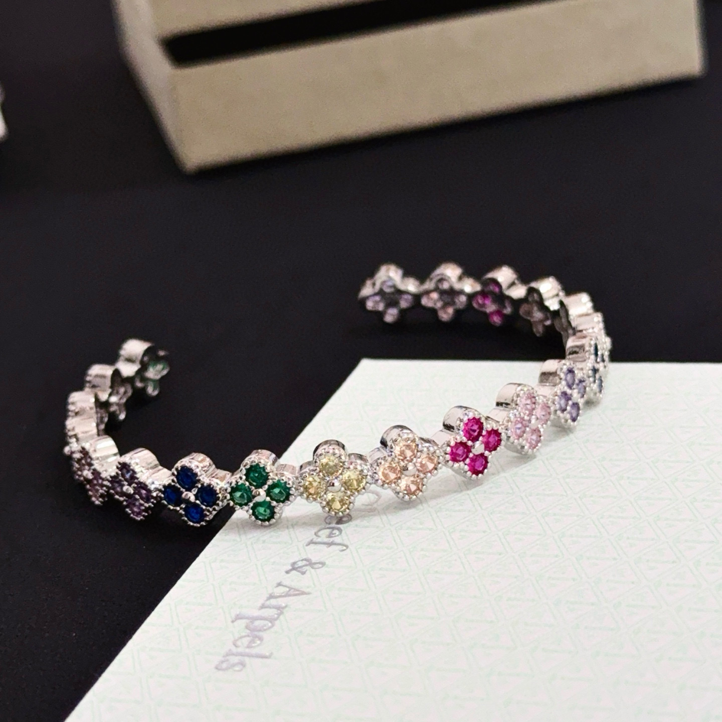 Van Cleef Arpels Alhambra bracelet Silver-toned metal with multicolor gemstones ruby red emerald green sapphire blue pink purple champagne 17cm