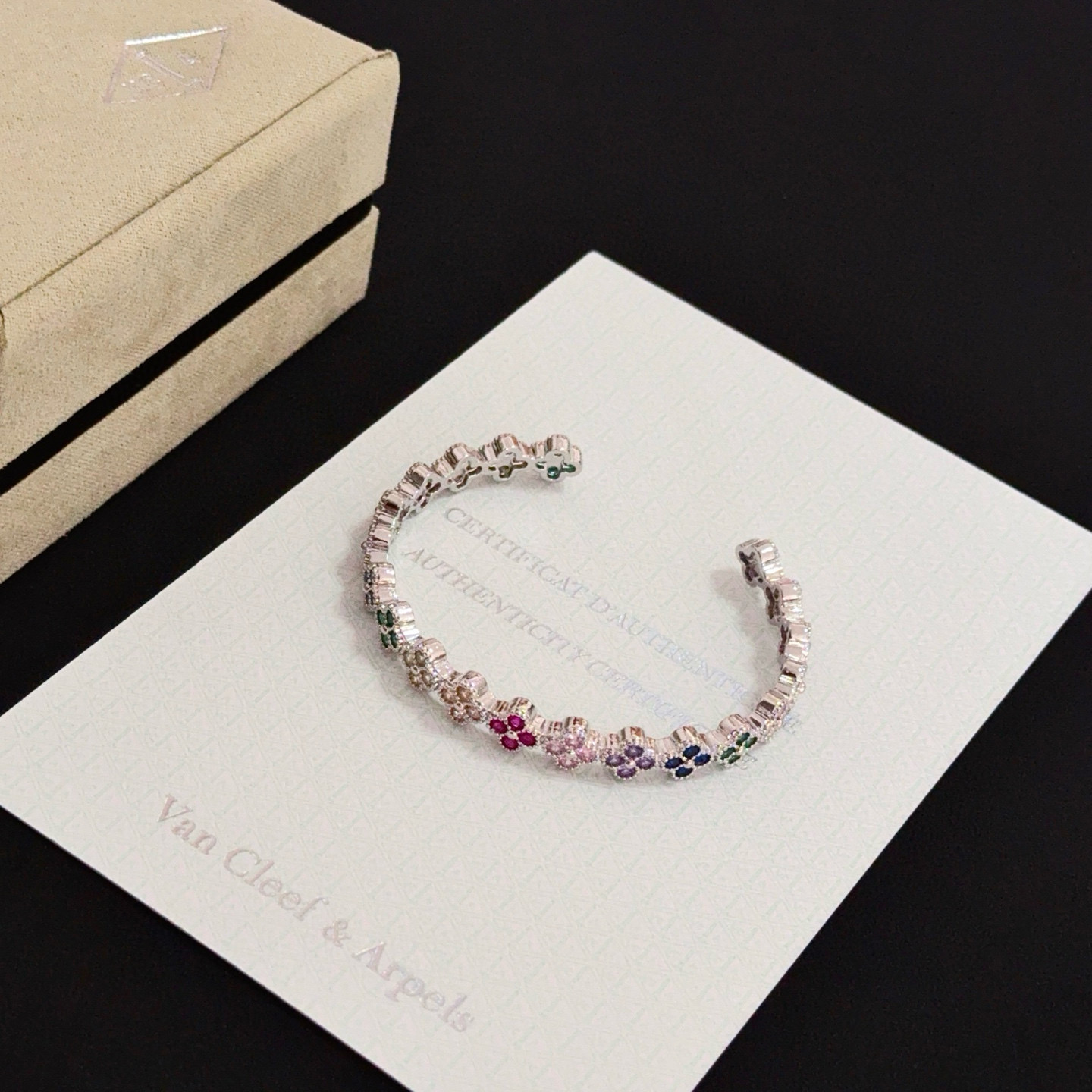 Van Cleef Arpels Alhambra bracelet Silver-toned metal with multicolor gemstones ruby red emerald green sapphire blue pink purple champagne 17cm