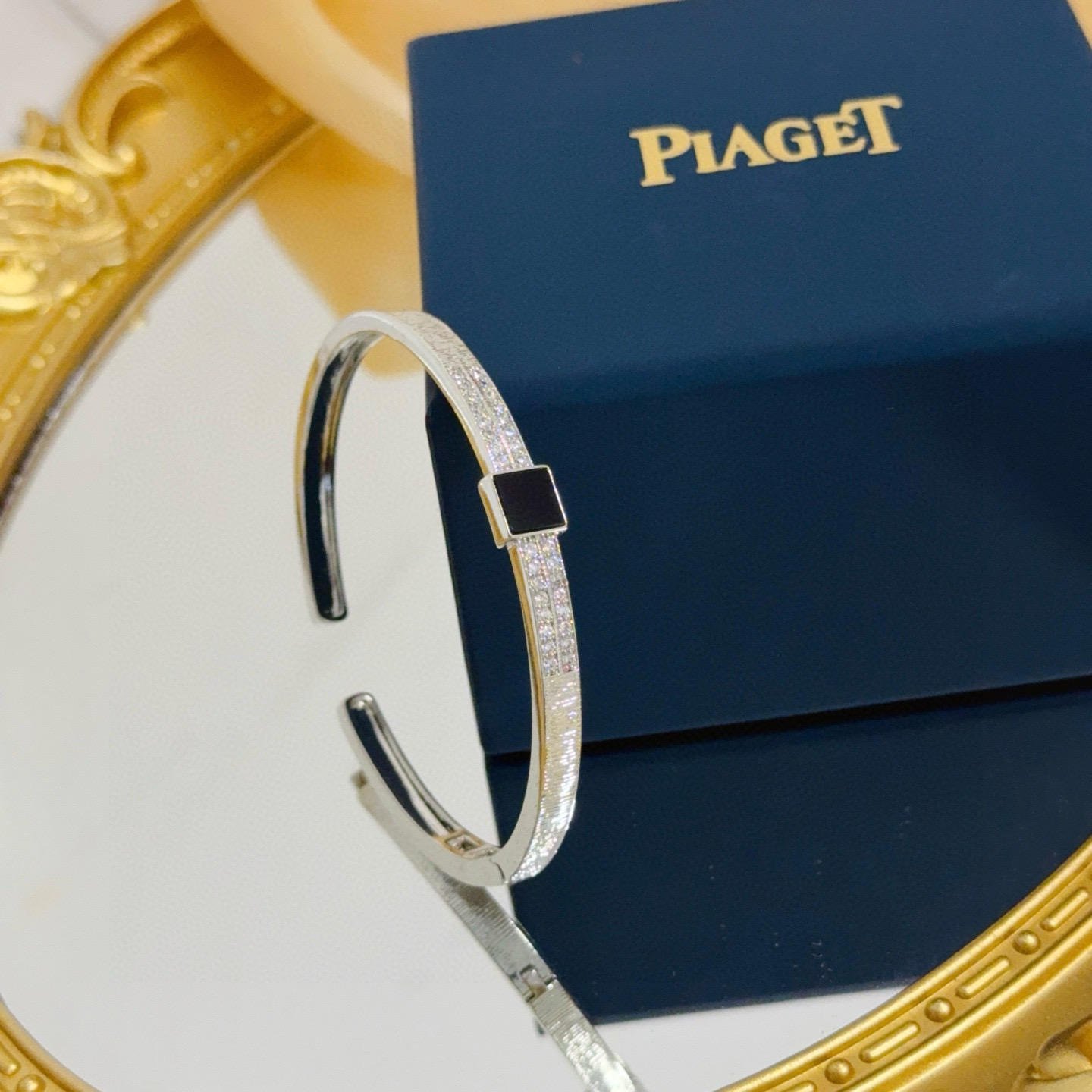 Piaget Possession bracelet Silver-toned metal with clear pave diamonds and black onyx accent 17cm