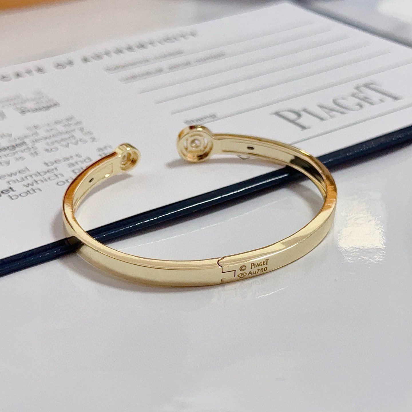 Piaget Possession bracelet yellow gold with black enamel and clear diamond accents 16cm inner circumference