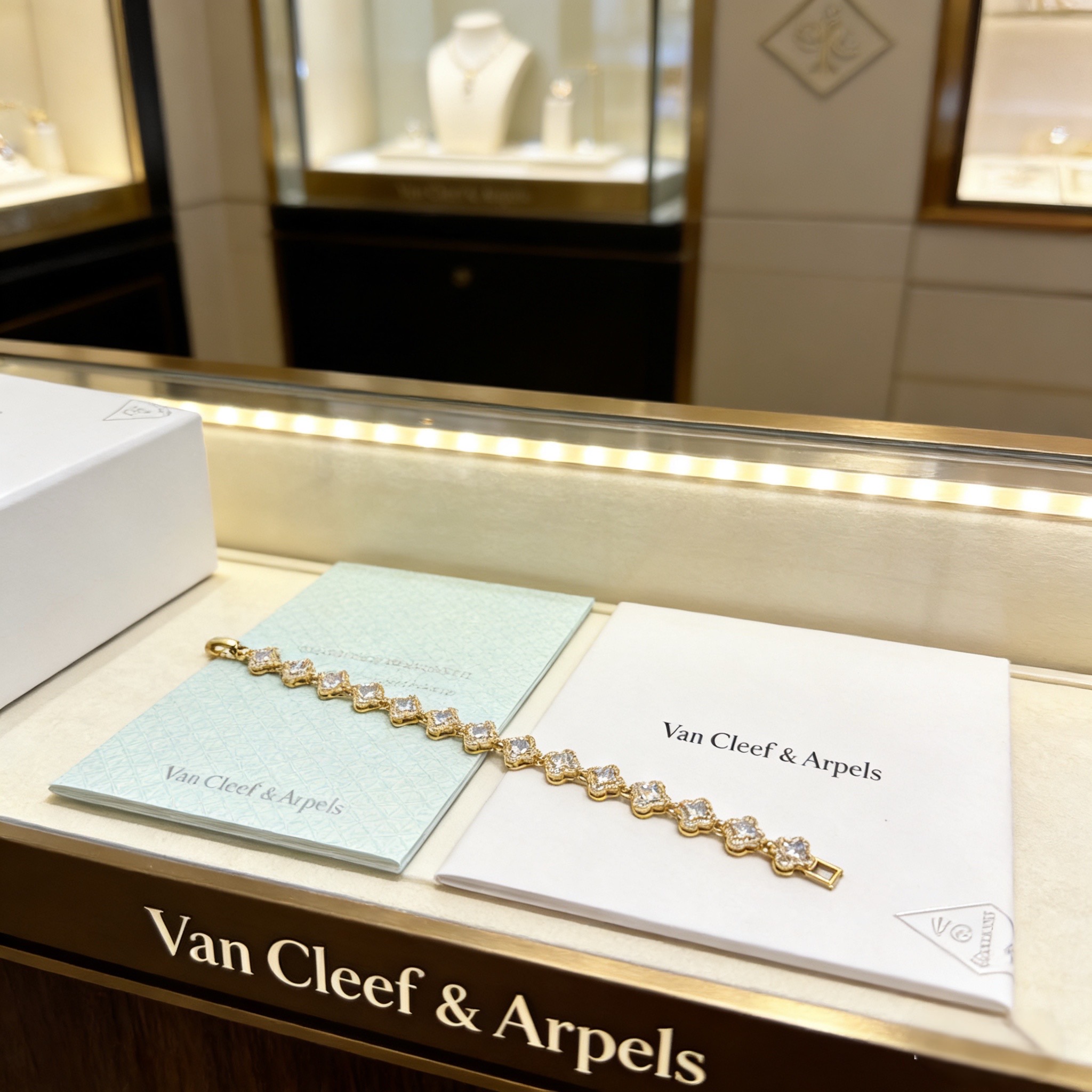 Van Cleef Arpels Alhambra bracelet yellow gold with clear faceted gemstones 18cm