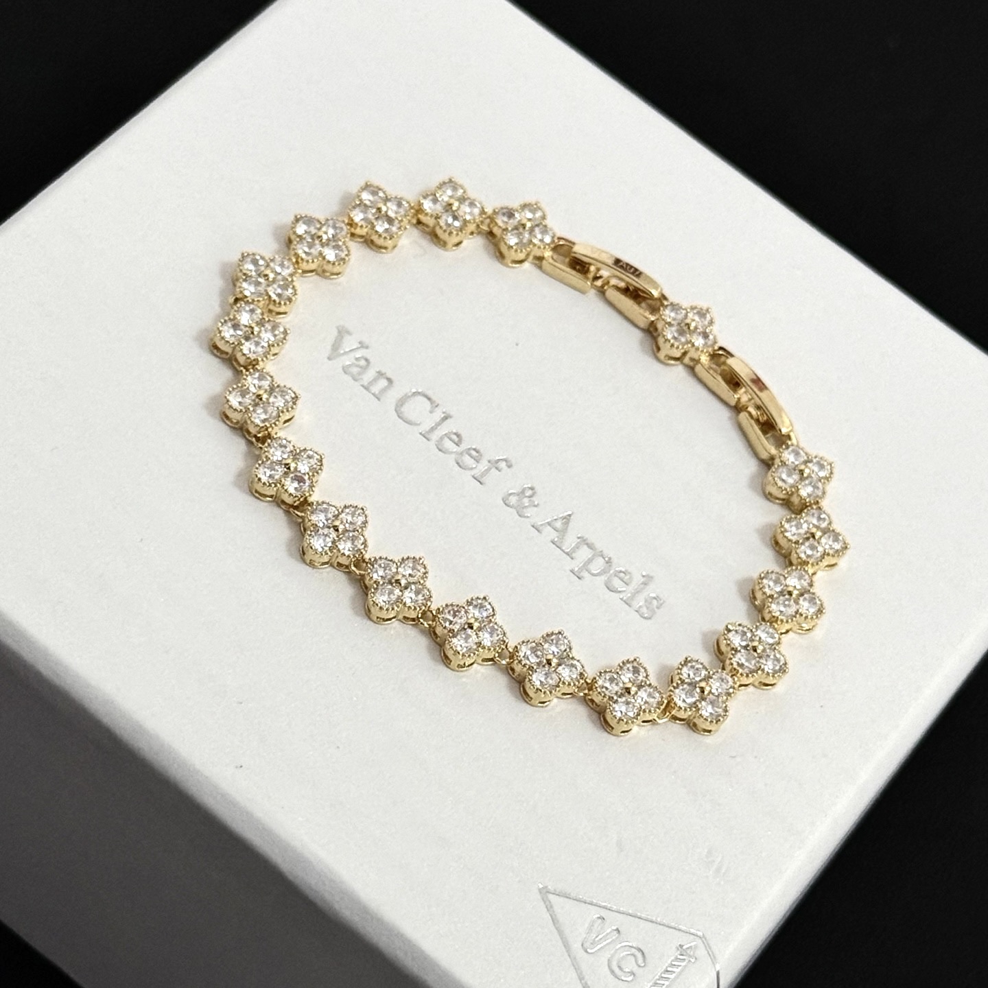 Van Cleef Arpels Alhambra bracelet yellow gold with clear faceted gemstones 18cm