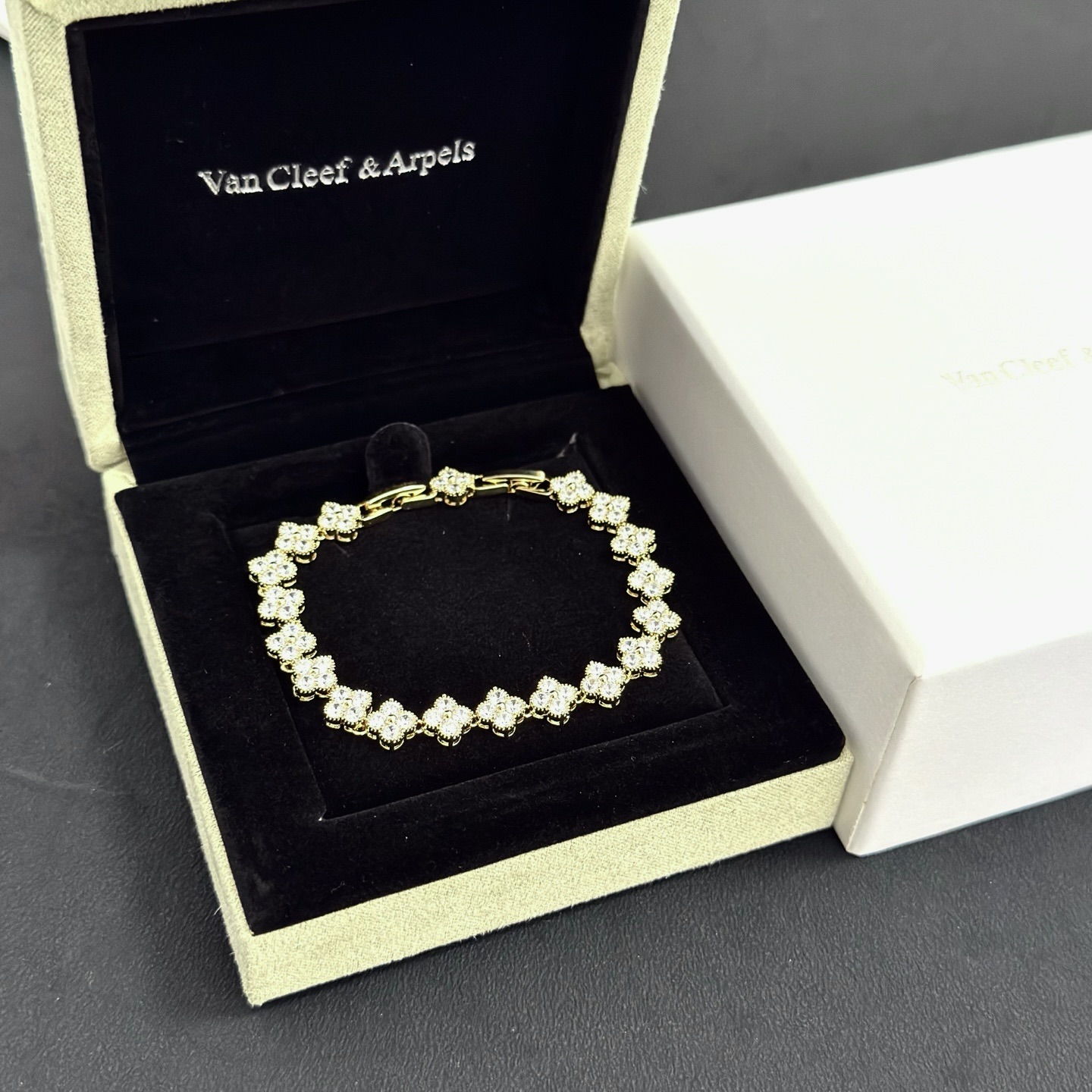 Van Cleef Arpels Alhambra bracelet yellow gold with clear faceted gemstones 18cm