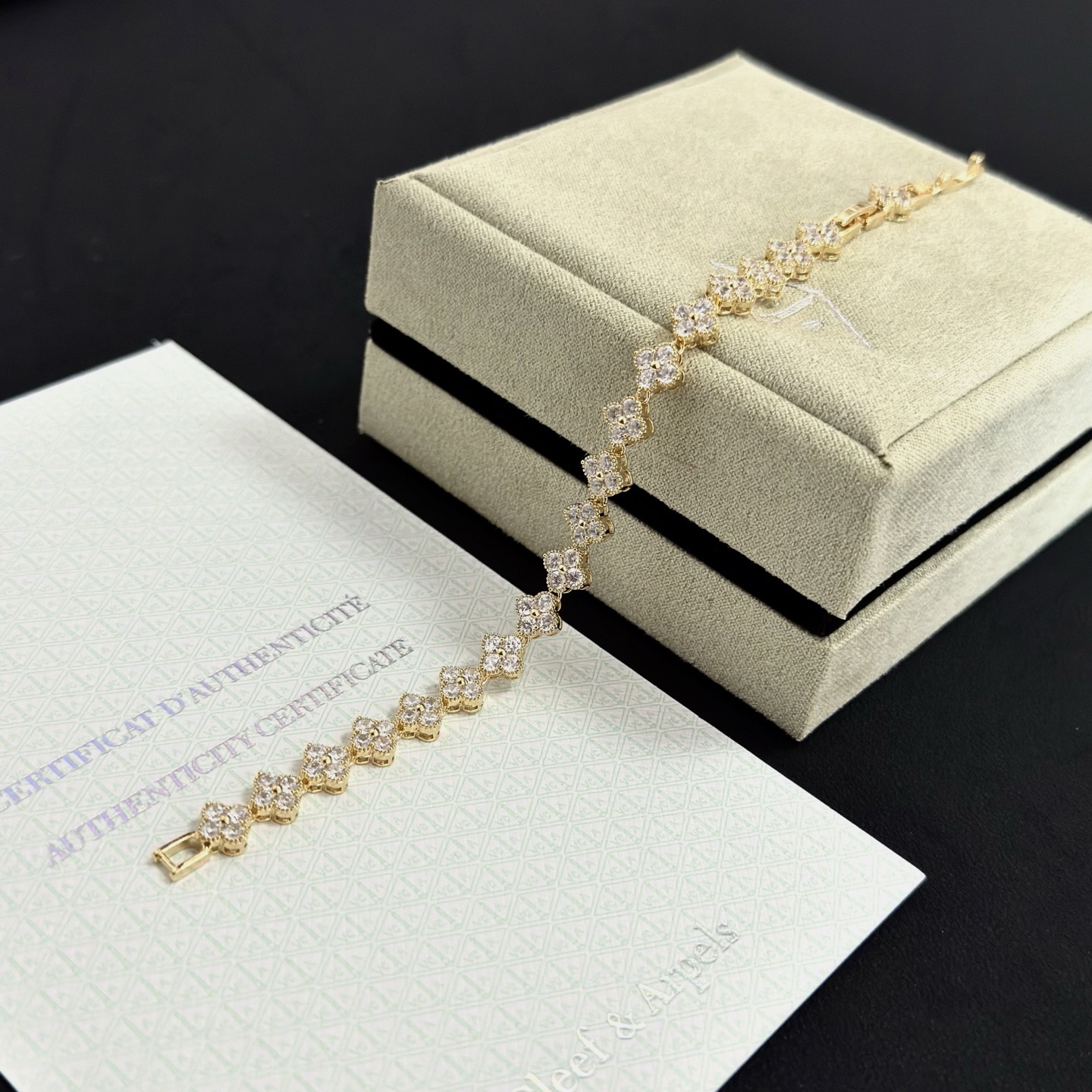Van Cleef Arpels Alhambra bracelet yellow gold with clear faceted gemstones 18cm