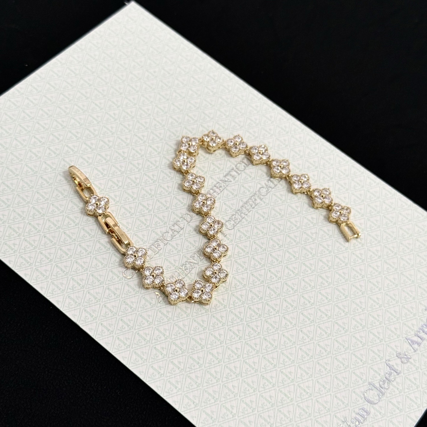 Van Cleef Arpels Alhambra bracelet yellow gold with clear faceted gemstones 18cm