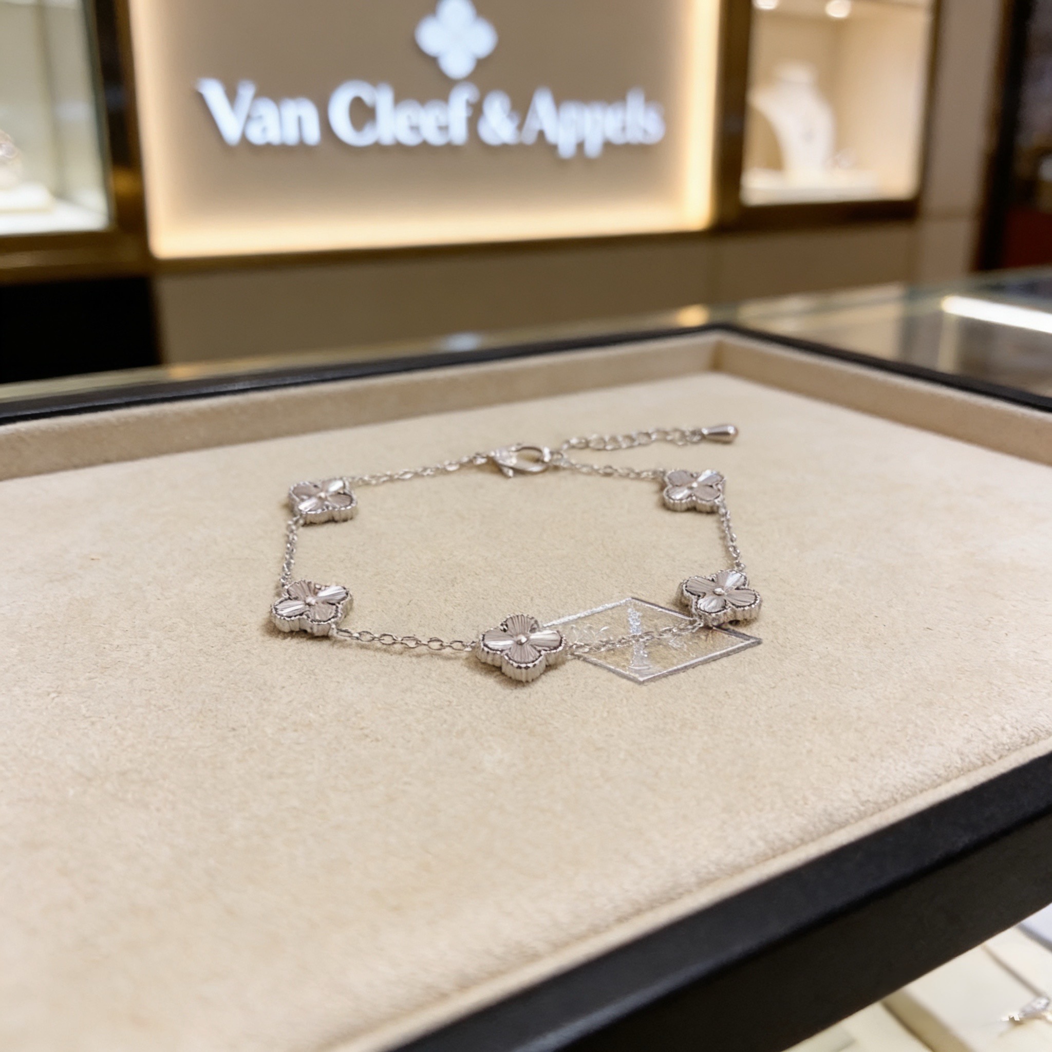Van Cleef Arpels Alhambra bracelet silver white gold with clear diamond accents 19cm