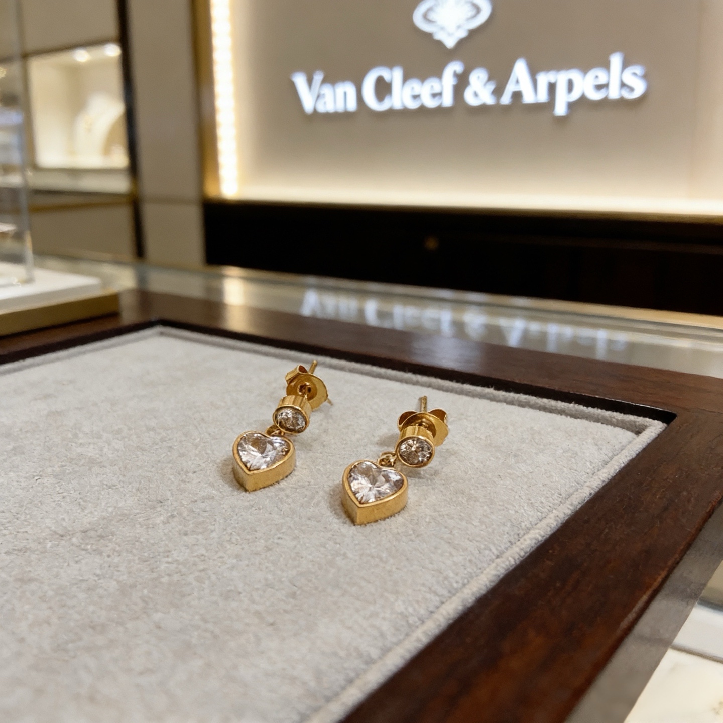 Van Cleef Arpels Heart Drop earrings yellow gold with clear faceted heart-cut stones 1 2cm drop length