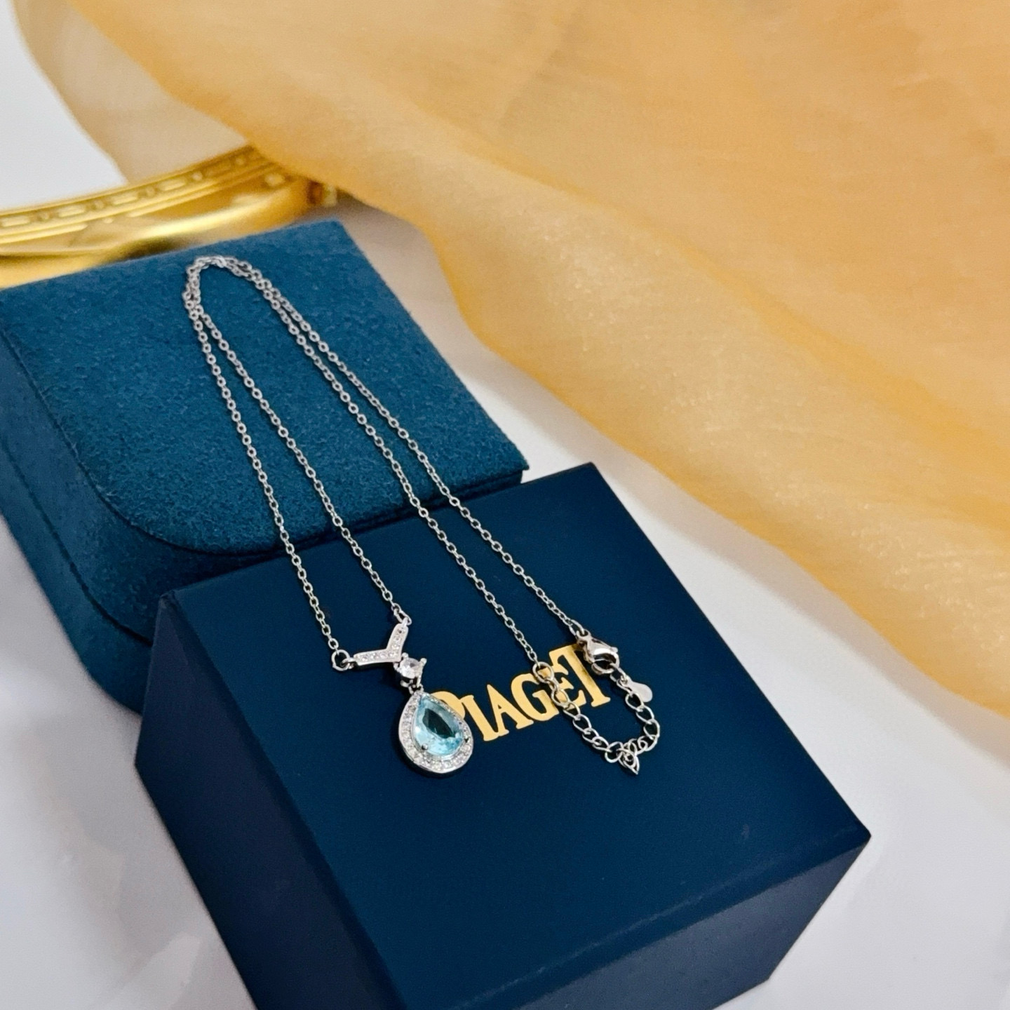 Piaget Teardrop Gemstone Pendant necklace Silver-toned white gold metal with light blue teardrop gemstone and white diamond accents 45cm