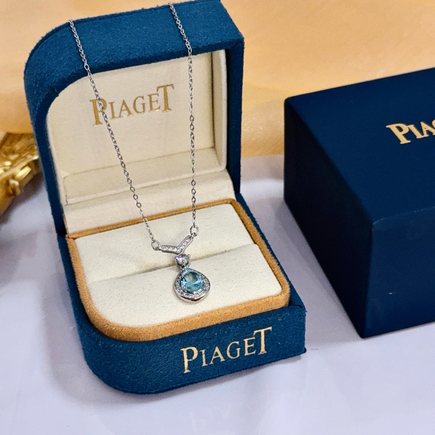 Piaget Teardrop Gemstone Pendant necklace Silver-toned white gold metal with light blue teardrop gemstone and white diamond accents 45cm