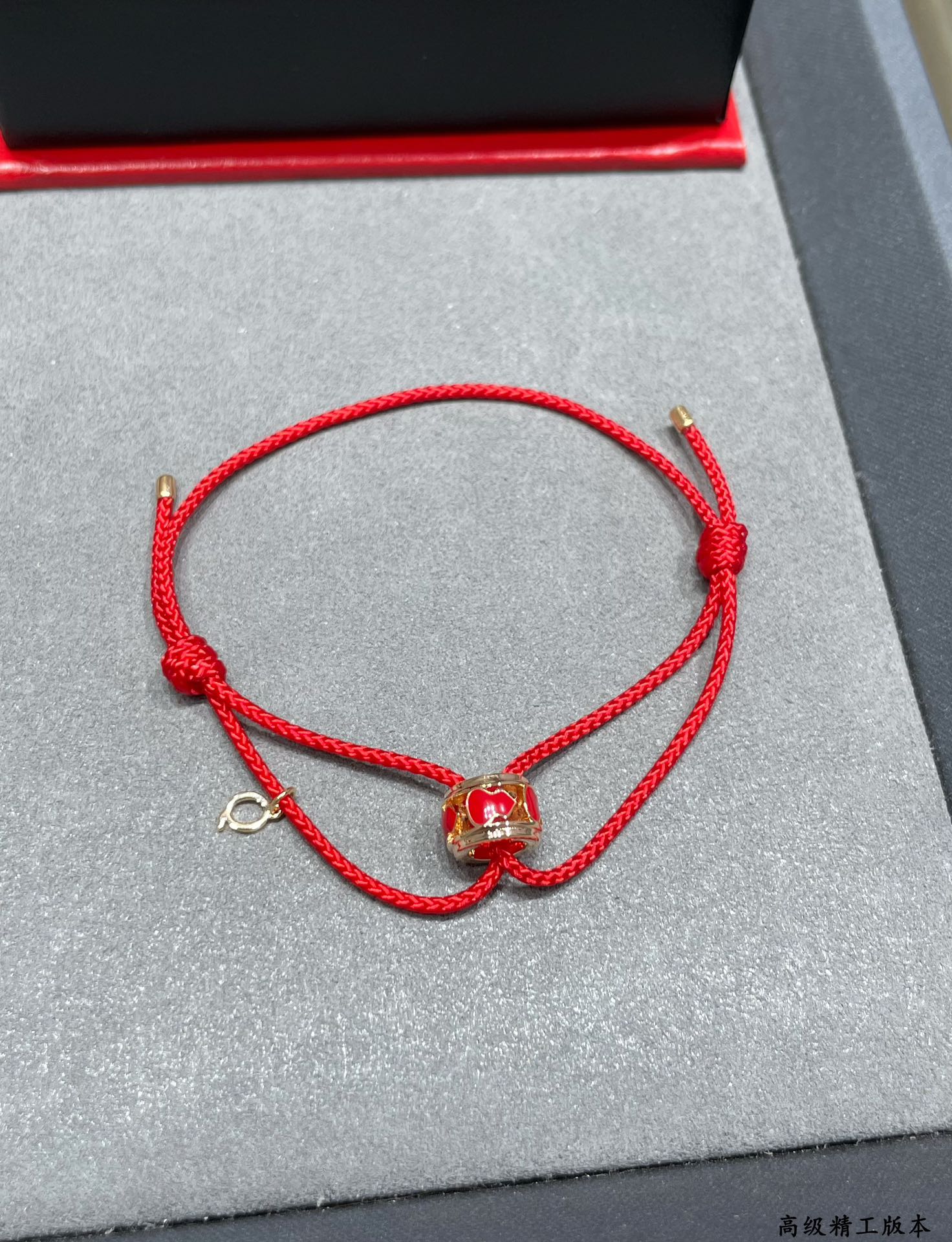 Qeelin Wulu bracelet rose gold red enamel clear diamond red cord adjustable