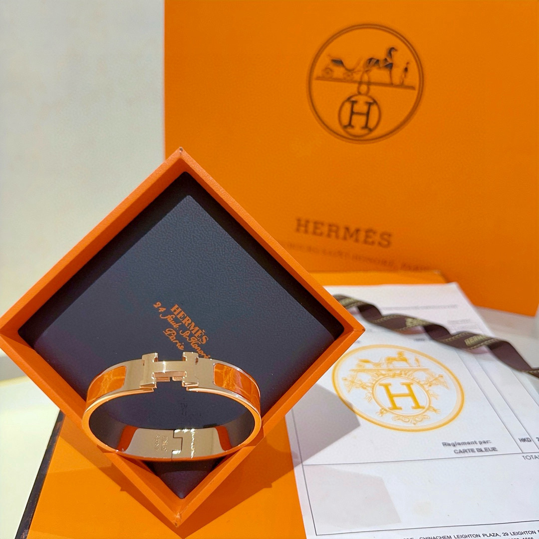 Bracciale Hermes Clic Clac H Metallo oro rosa con smalto arancione PM
