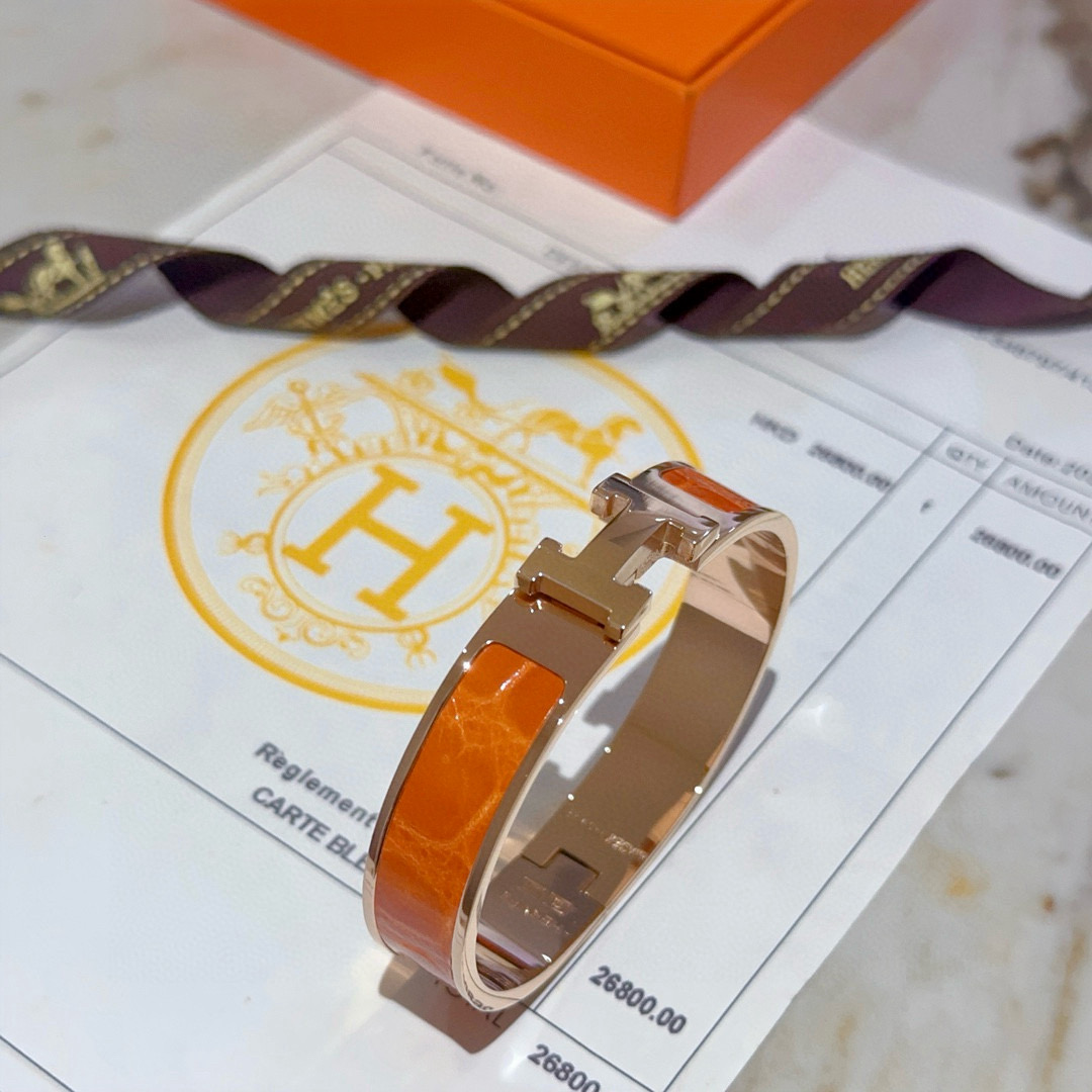 Bracciale Hermes Clic Clac H Metallo oro rosa con smalto arancione PM