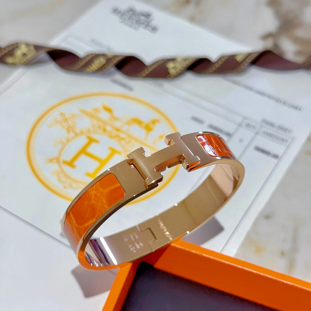 Bracciale Hermes Clic Clac H Metallo oro rosa con smalto arancione PM
