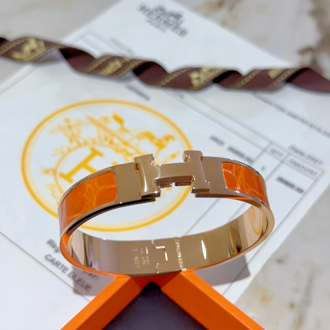 Bracciale Hermes Clic Clac H Metallo oro rosa con smalto arancione PM