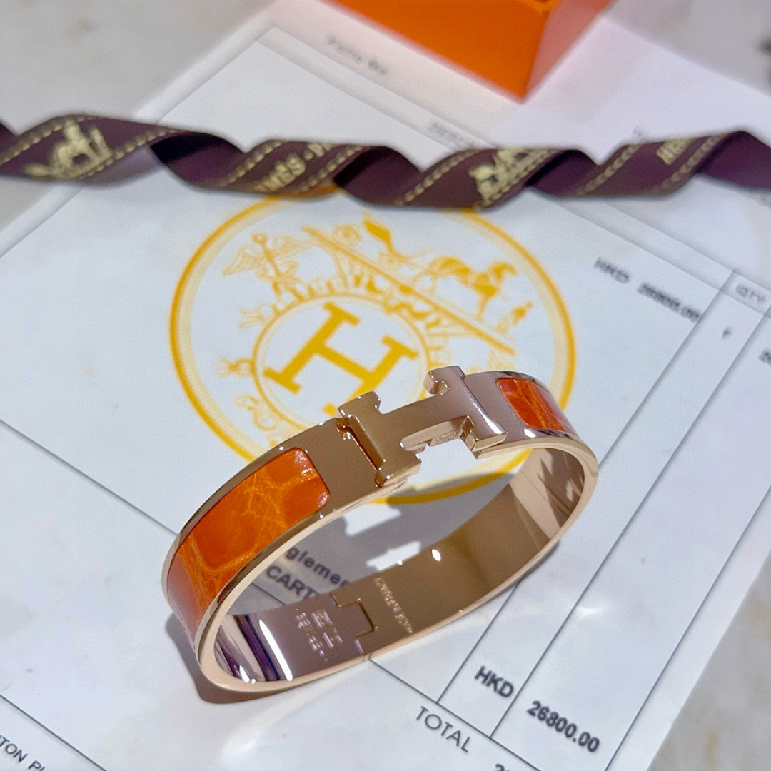 Bracciale Hermes Clic Clac H Metallo oro rosa con smalto arancione PM