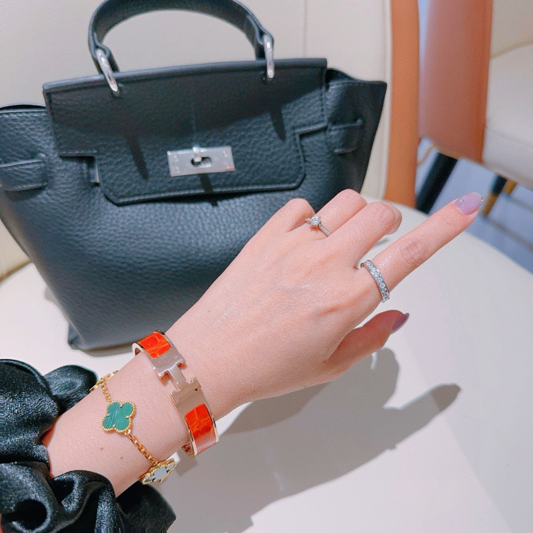 Bracciale Hermes Clic Clac H Metallo oro rosa con smalto arancione PM