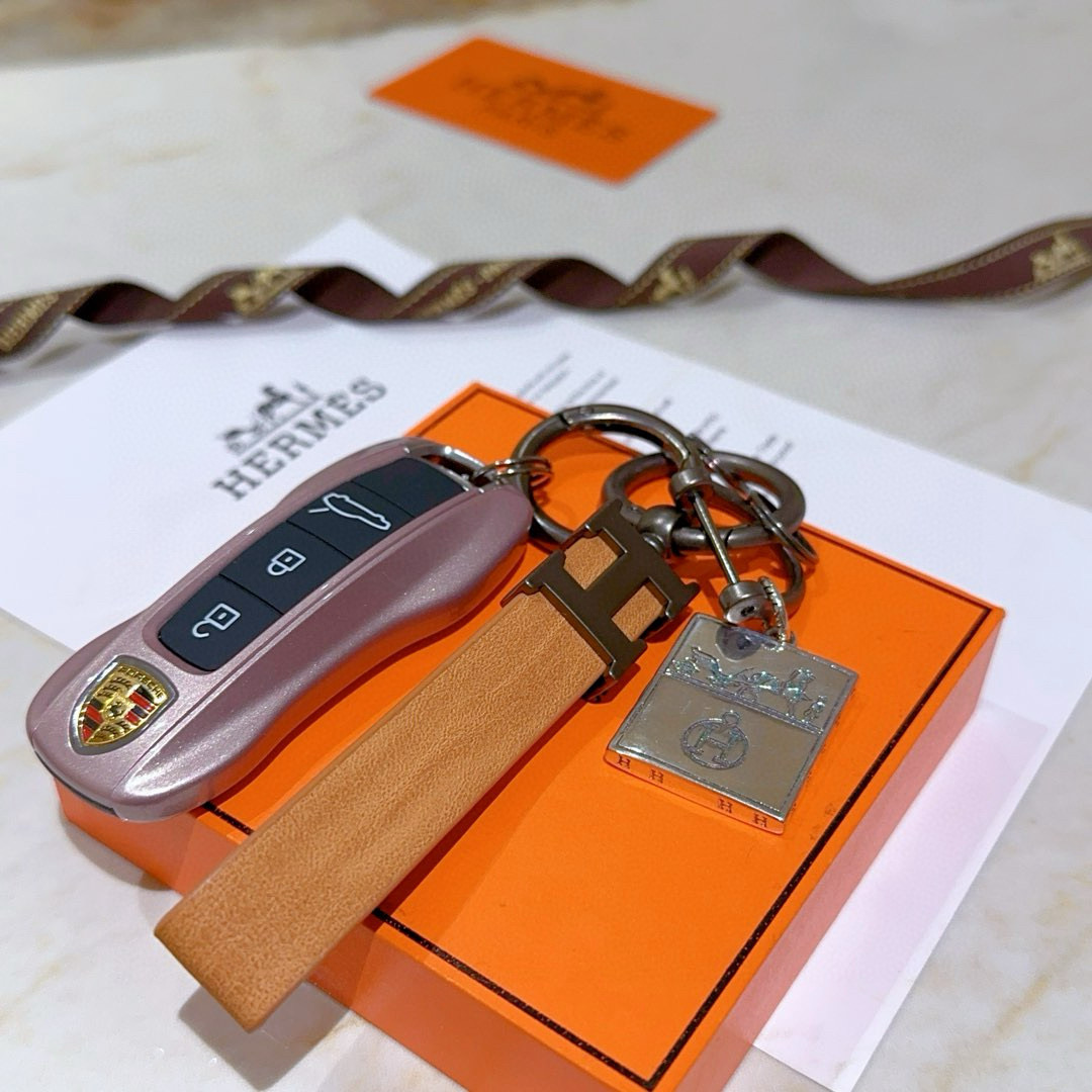 Ciondolo portachiavi in ​​pelle Hermes H Logo Pelle marrone chiaro canna di fucile metallo argento 12 cm