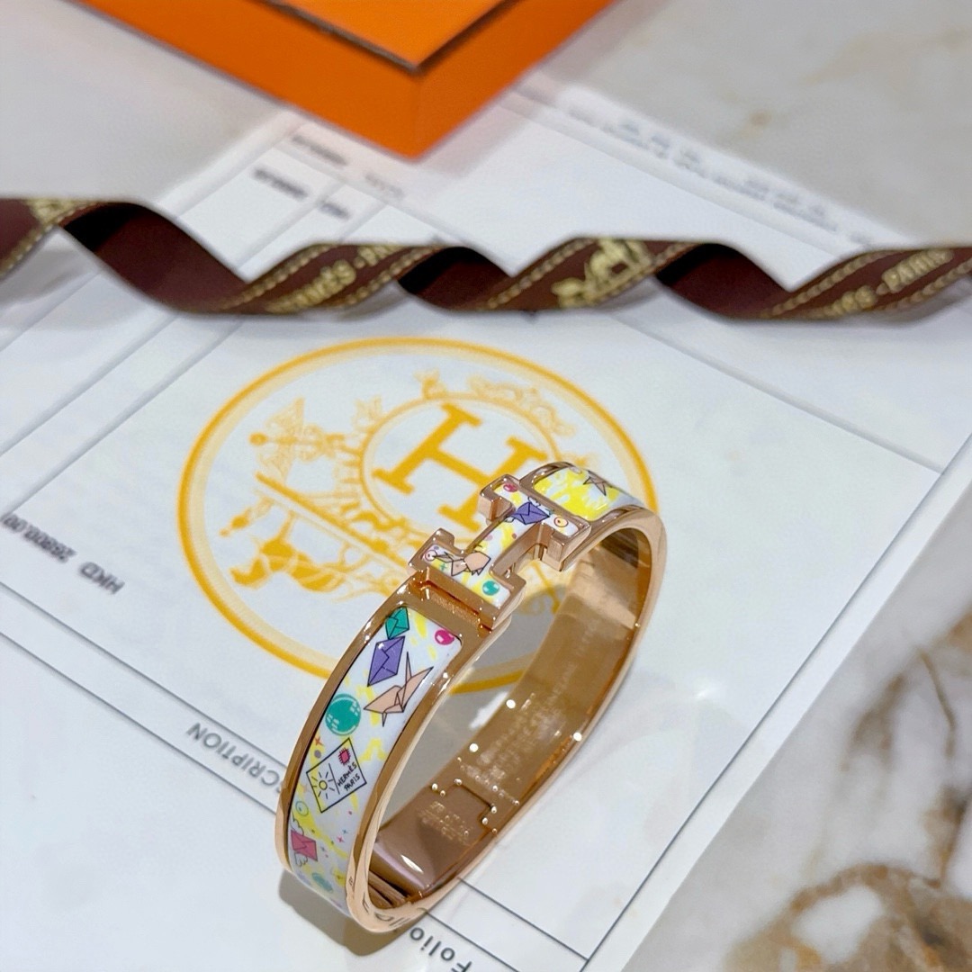 Pulseira Hermes Clic H Metal banhado a ouro rosa com esmalte branco e amarelo com estampa de origami multicolor PM