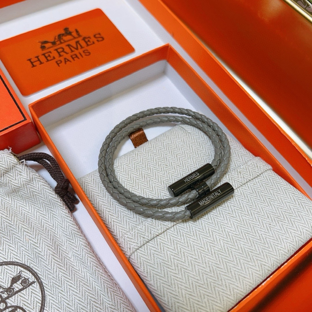 Bracciale Hermes Tournis Tresse in pelle intrecciata grigia hardware nero canna di fucile 19 cm