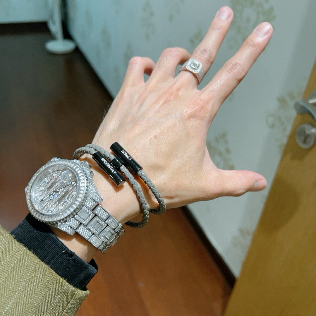 Bracciale Hermes Tournis Tresse in pelle intrecciata grigia hardware nero canna di fucile 19 cm