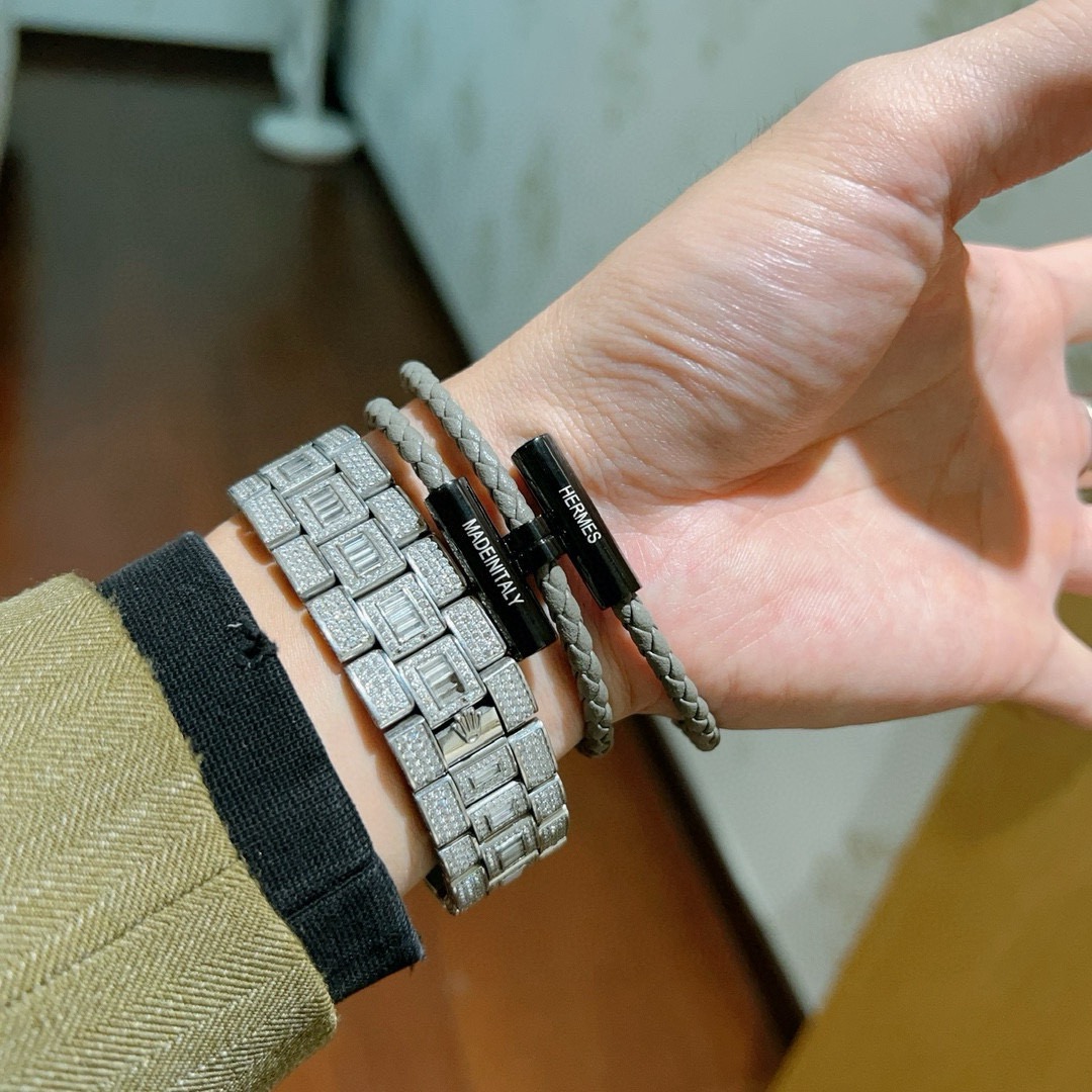 Bracciale Hermes Tournis Tresse in pelle intrecciata grigia hardware nero canna di fucile 19 cm