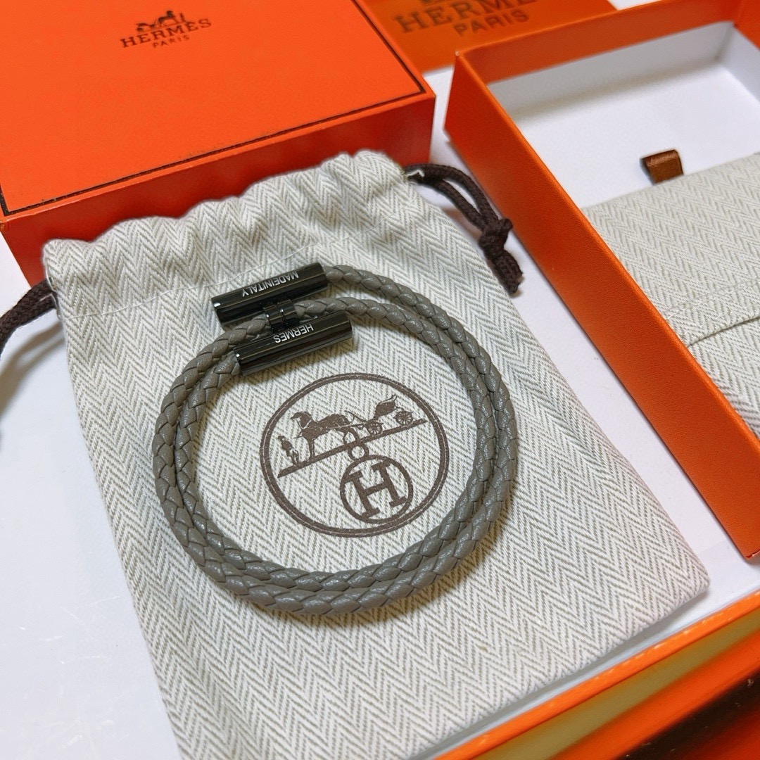 Bracciale Hermes Tournis Tresse in pelle intrecciata grigia hardware nero canna di fucile 19 cm