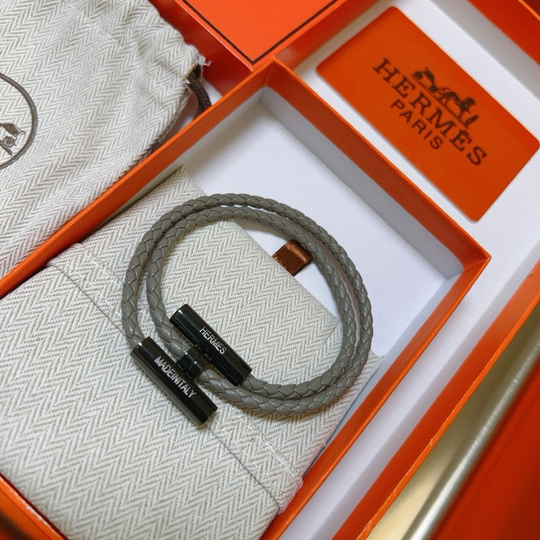 Bracciale Hermes Tournis Tresse in pelle intrecciata grigia hardware nero canna di fucile 19 cm