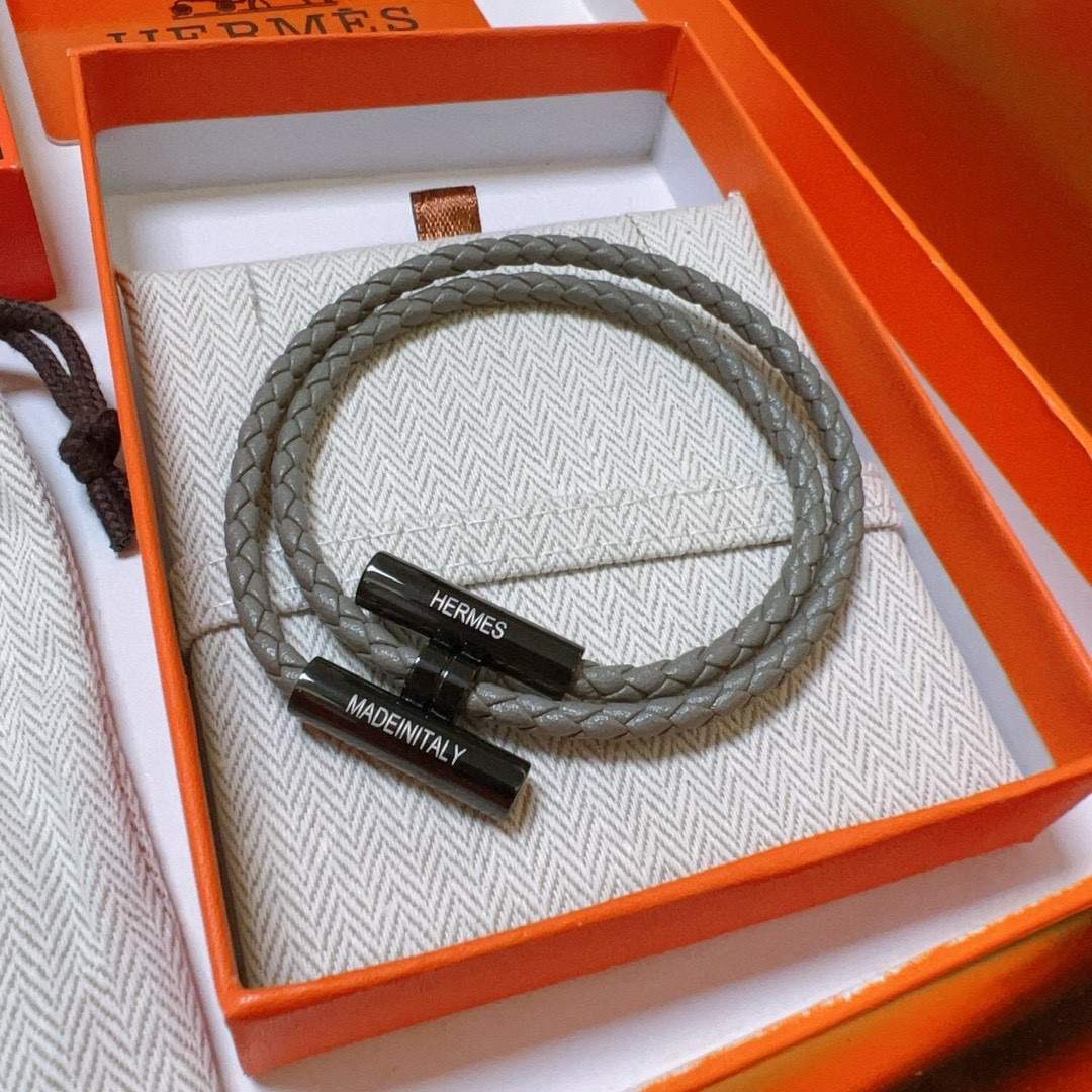Bracciale Hermes Tournis Tresse in pelle intrecciata grigia hardware nero canna di fucile 19 cm