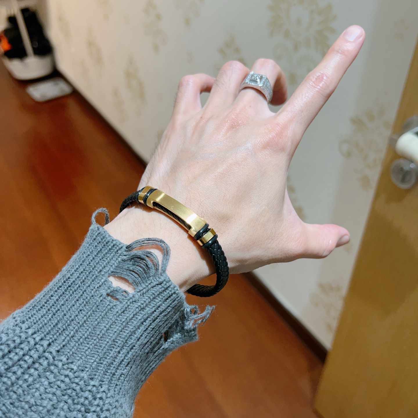 Bracciale Hermes Jet Braided Leather Bracciale Pelle intrecciata nera con hardware in metallo color oro 19 cm