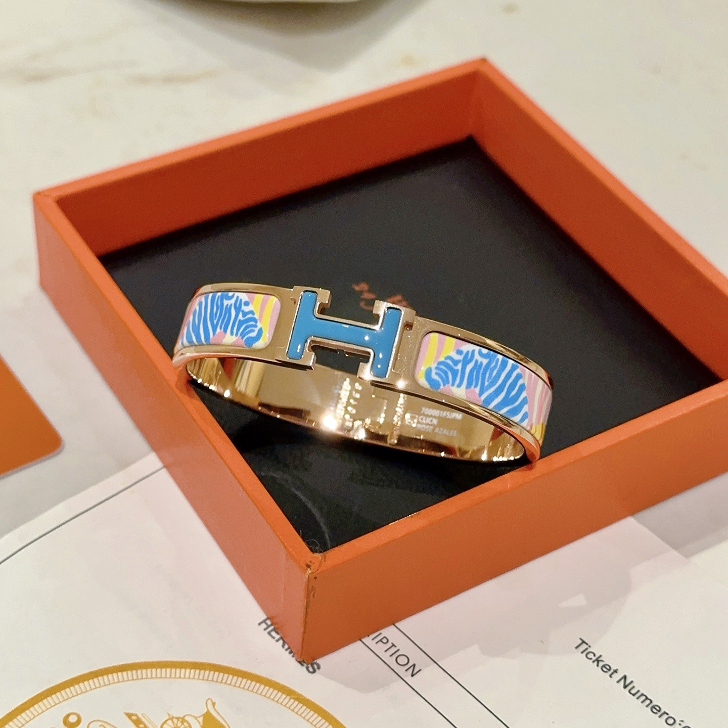 Bracciale Hermes Clic H Metallo placcato oro rosa con smalto blu rosa giallo bianco zebrato PM