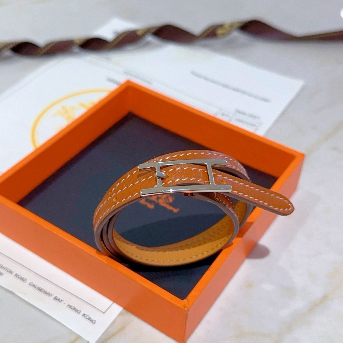 Bracciale Hermes Behapi Double Tour in pelle marrone chiaro con hardware in argento palladio regolabile in doppia lunghezza