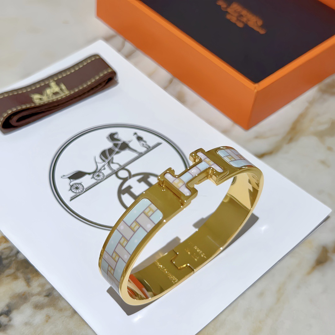 Bracciale Hermes Clic H in metallo color oro con smalto PM azzurro e bianco
