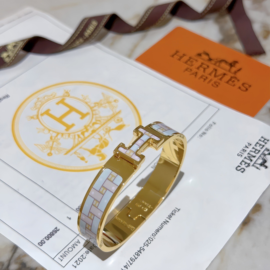 Bracciale Hermes Clic H in metallo color oro con smalto PM azzurro e bianco