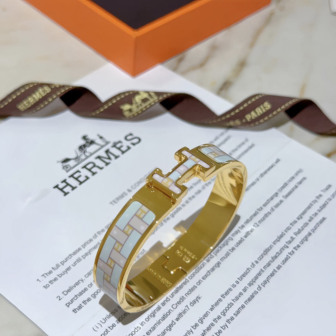 Bracciale Hermes Clic H in metallo color oro con smalto PM azzurro e bianco