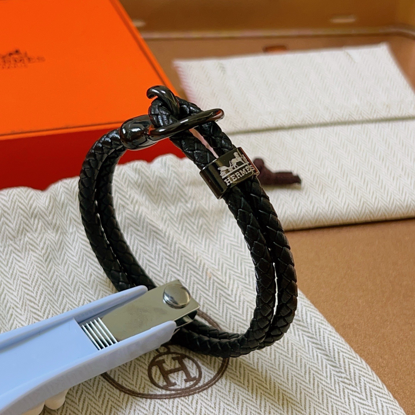 Bracciale Hermes New H Pelle intrecciata nera con hardware nero canna di fucile 19 cm