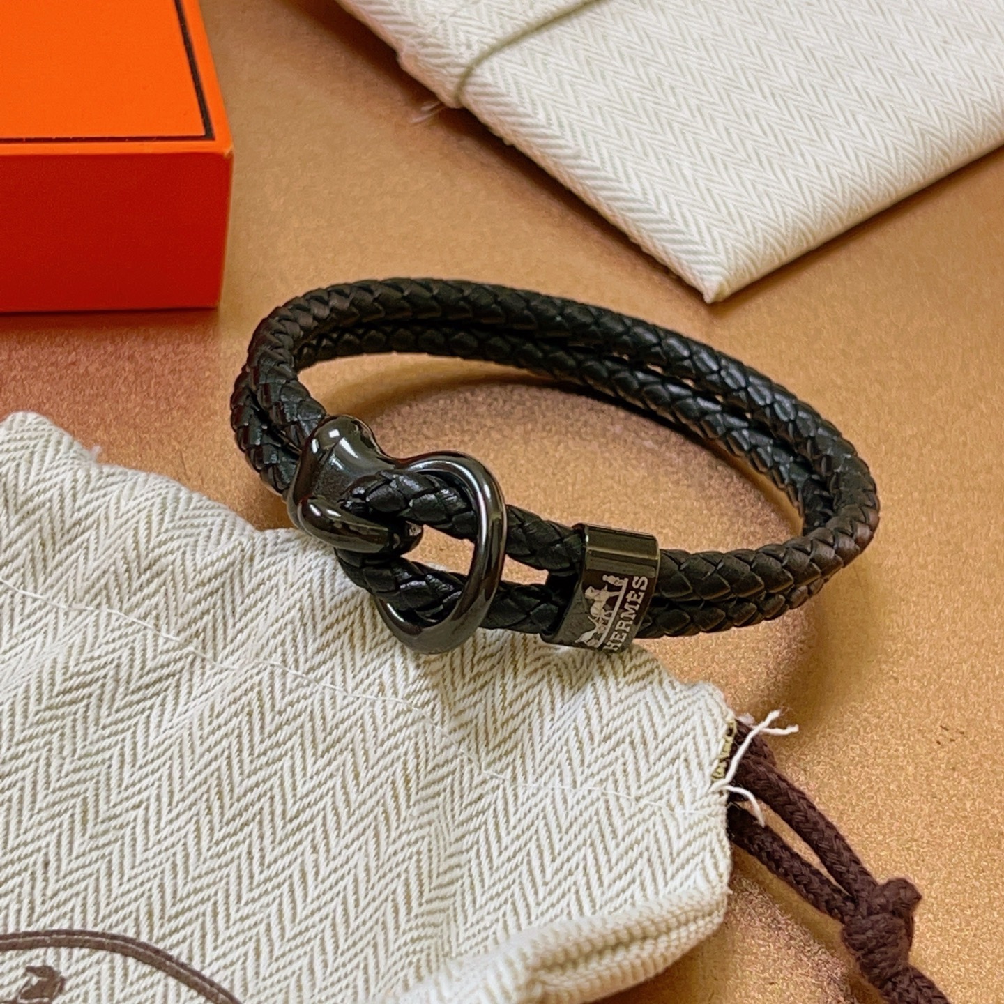 Bracciale Hermes New H Pelle intrecciata nera con hardware nero canna di fucile 19 cm
